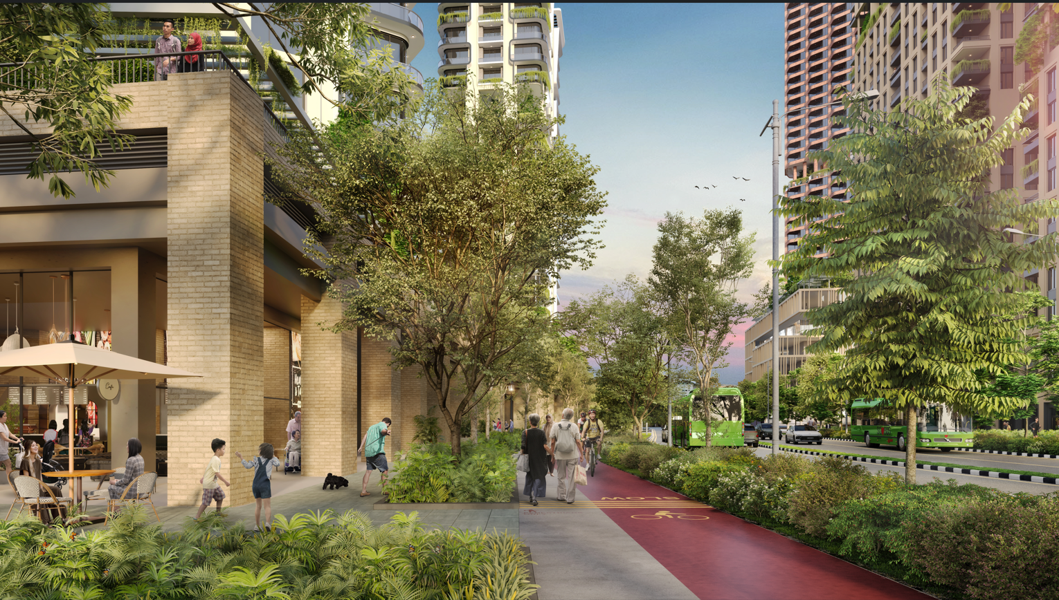Street scene with buildings, trees, people, and a red bike lane next to a road with buses.